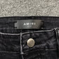 AMIRI VARSITY LOGO REPAIR JEANS