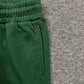 DENIM TEARS COTTON WREATH SWEATPANTS DARK GREEN