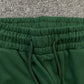 DENIM TEARS COTTON WREATH SWEATPANTS DARK GREEN