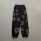 DENIM TEARS COTTON WREATH SWEATPANTS MONOCHROME BLACK