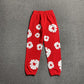 DENIM TEARS COTTON WREATH SWEATPANTS RED