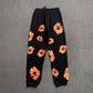 DENIM TEARS x OFFSET WREATH SWEATPANTS BLACK