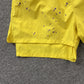 SP5DER DOUBLE LAYER SHORTS YELLOW
