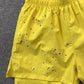 SP5DER DOUBLE LAYER SHORTS YELLOW