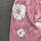 DENIM TEARS COTTON WREATH SWEATPANTS PINK