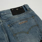 CHROME HEARTS CROSS PATCH BLACK EDGE JORTS WASHED DENIM